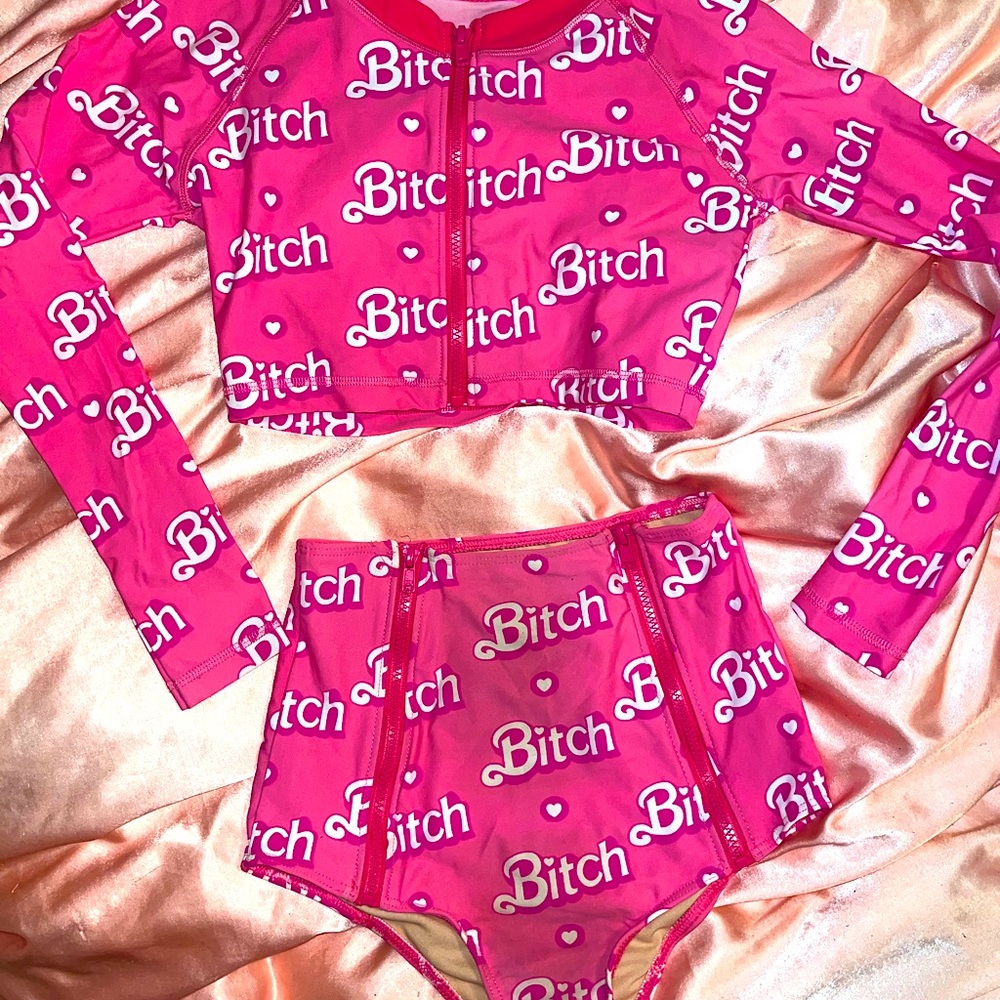 Dolls Kill pink bitch shorts set